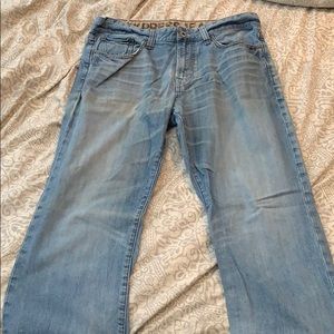 Express Loose Stretch Jeans. Size 33x34